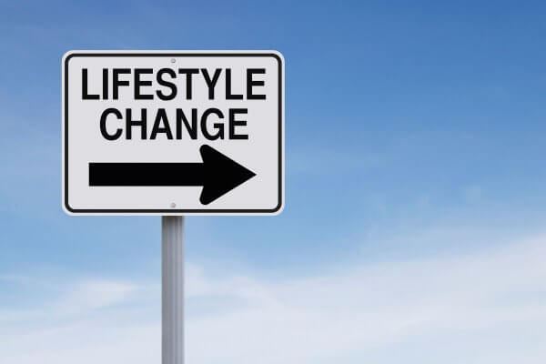 Healthy lifestyle change sign against a blue sky