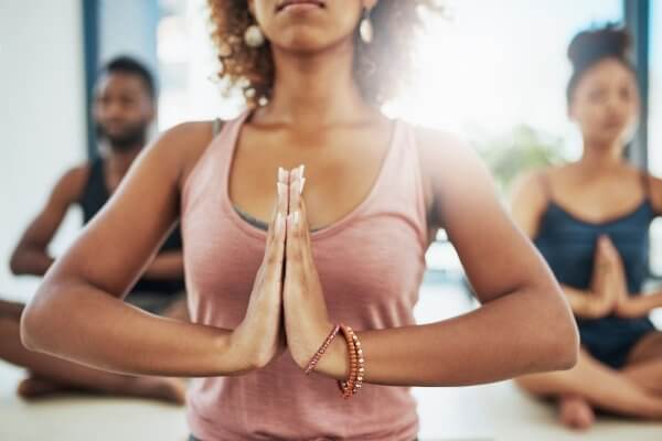 group of people in yoga class - one of the tips for a balanced life